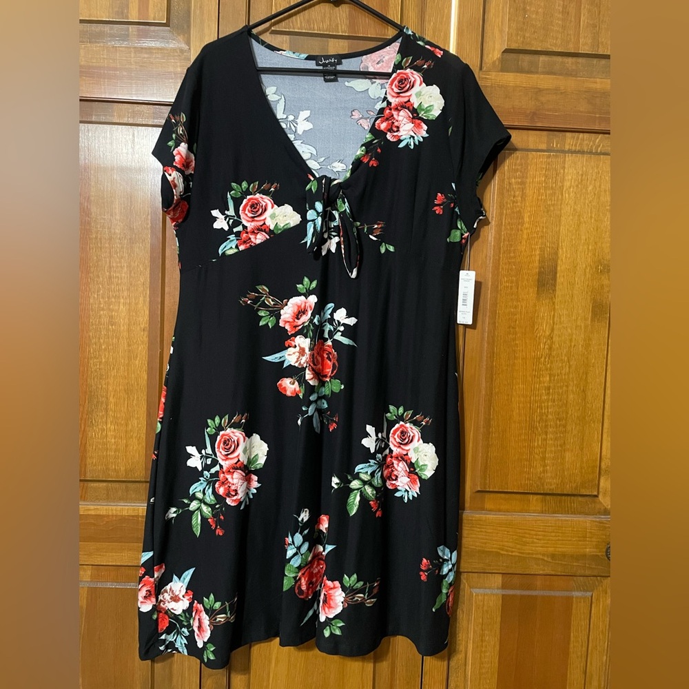 Black dress with floral pattern.